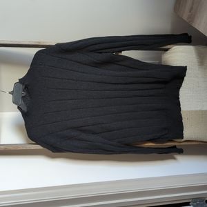 Men's black knit turtle neck.
